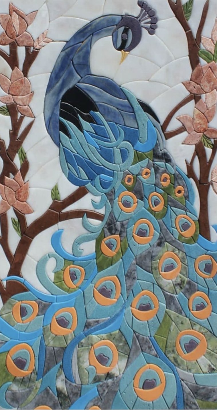 Handcrafted peacock mosaic with blue and green feathers, surrounded by botanical forms.